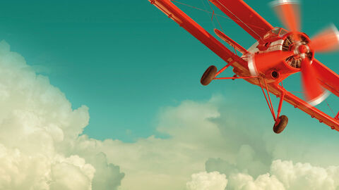 JB_2021_März_Fachtagung_Cloud Rotes Propeller-Flugzeug in den Wolken