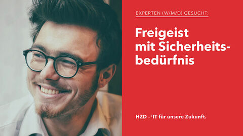 Porträt eines sympathisch aussehenden IT-Experten mit hipper Brille und Dreitagesbart